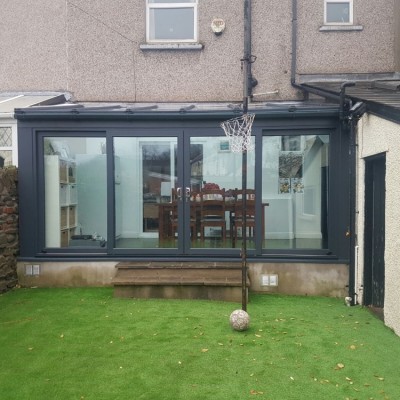 New conservatory and artificial grass.